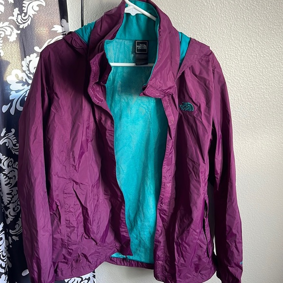 The north face windbreaker size women’s XL. Purple and teal. Has zipper pockets. - Picture 1 of 5